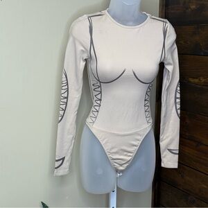 Stylish Cream nude Long Sleeve Bodysuit Size 6 Maniere de Voir